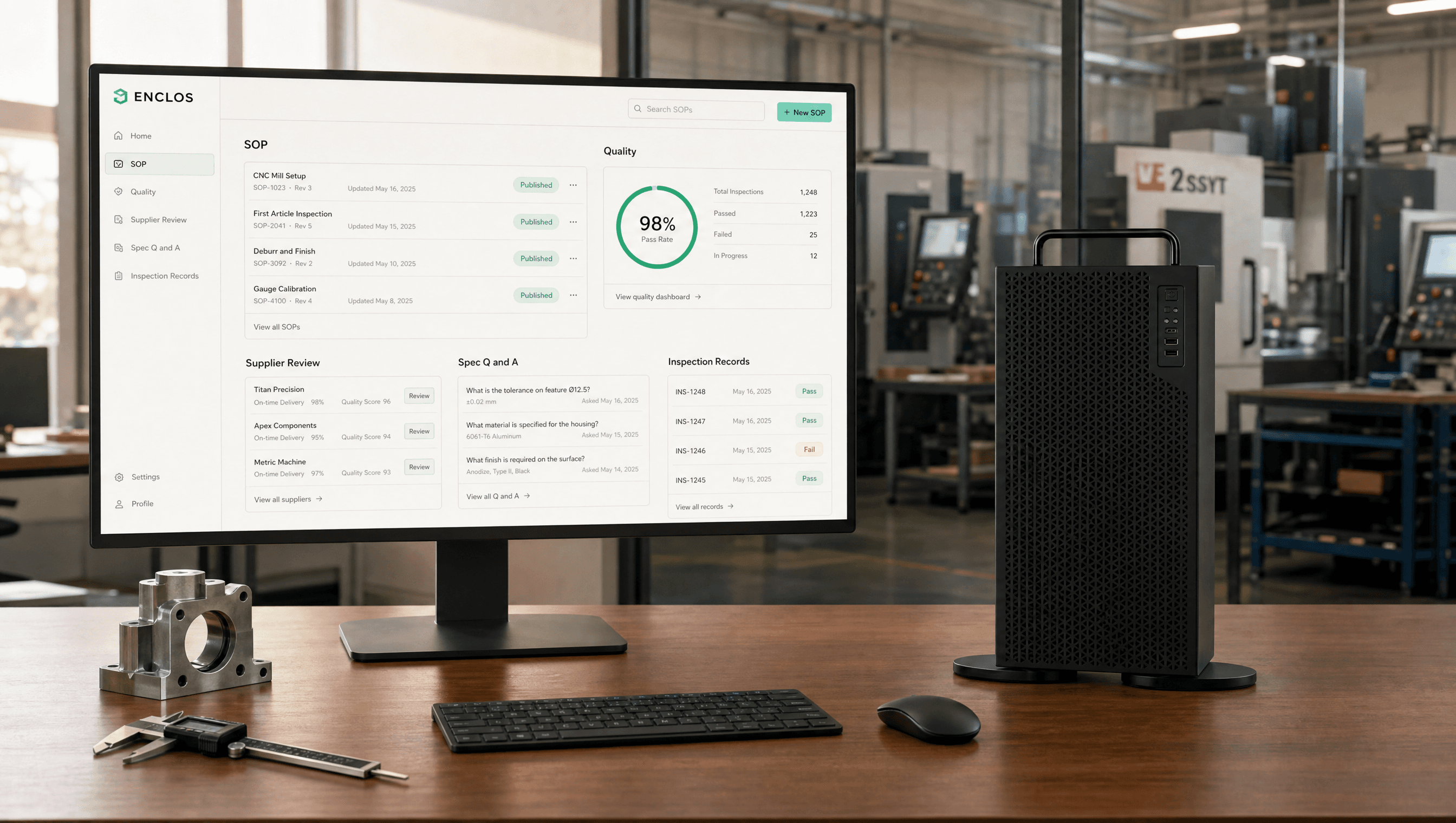 The Enclos appliance beside a laptop running the Enclos workspace for a technical manufacturer