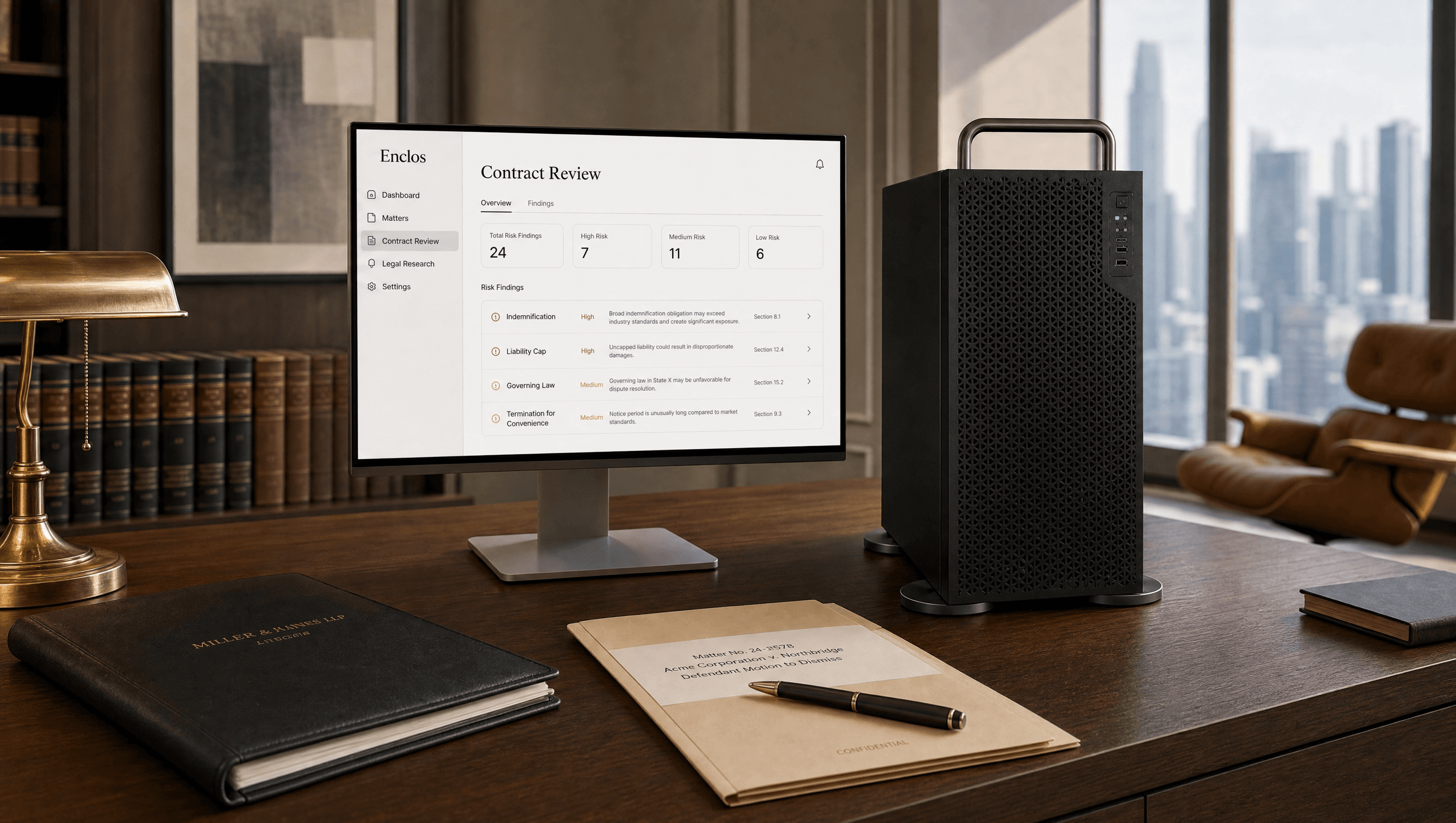 The Enclos appliance beside a laptop running the Enclos workspace configured for a law firm